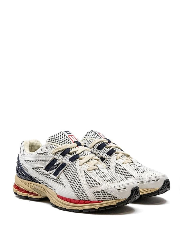 New Balance 1906R – Metallic Silver & Navy